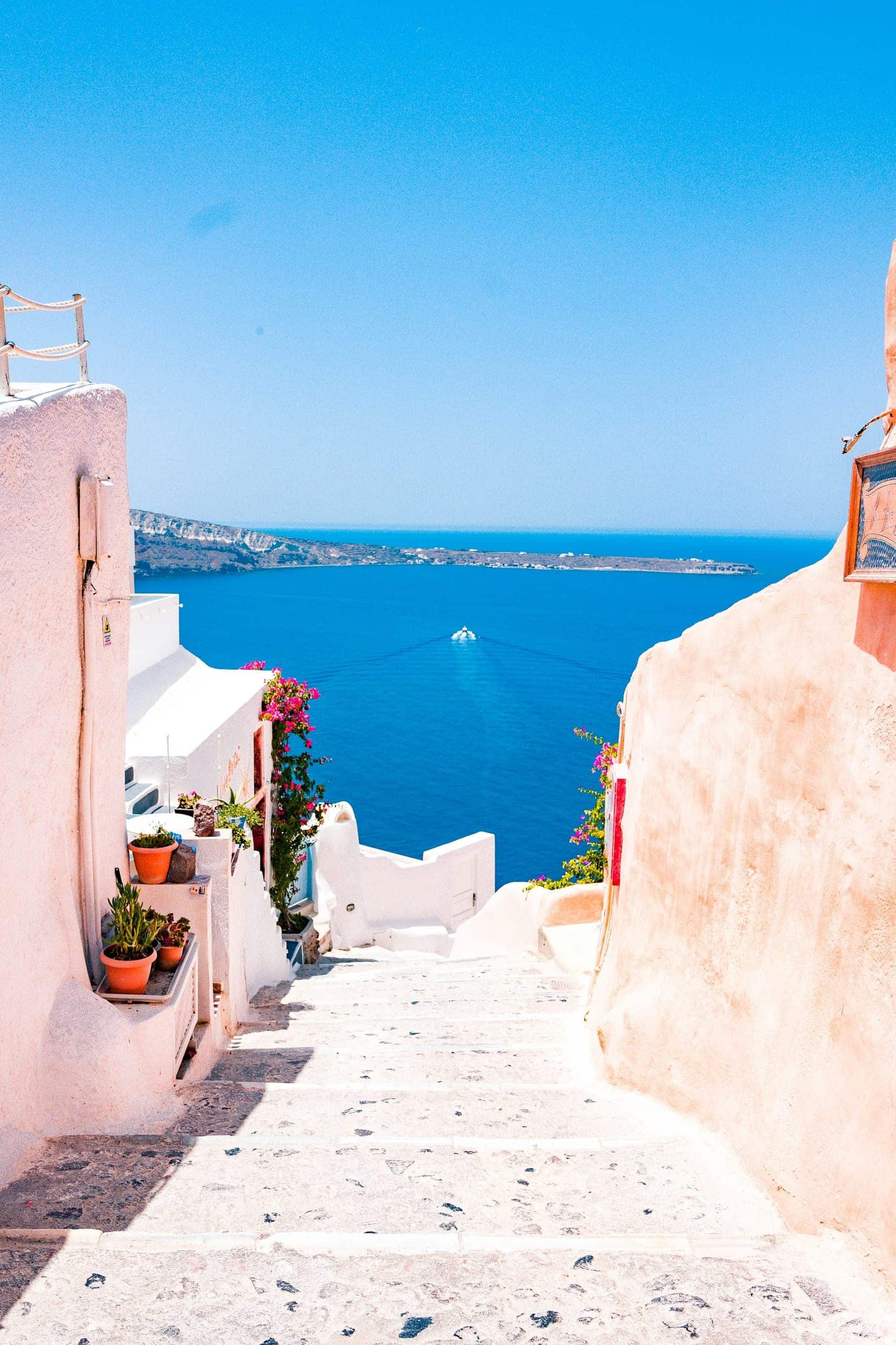 White Cycladic village above the Aegean
